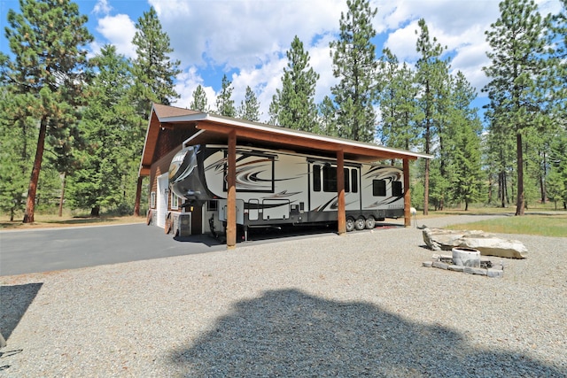 exterior space with a carport