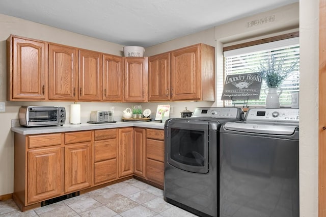 washroom with washer and clothes dryer