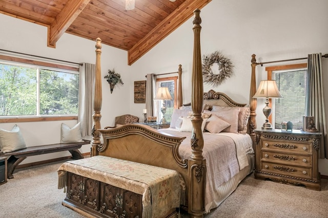 carpeted bedroom featuring vaulted ceiling with beams and wood ceiling