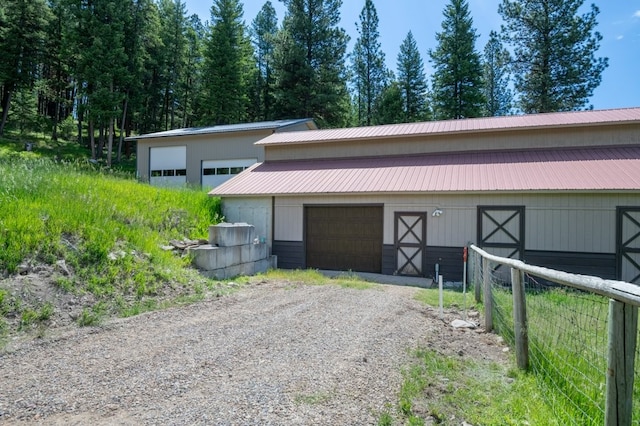 exterior space featuring wood walls