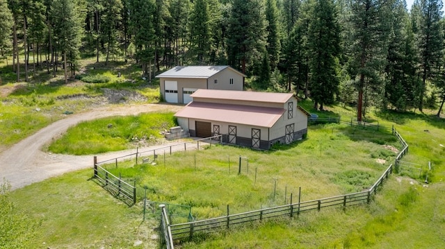 birds eye view of property featuring a rural view