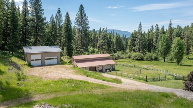 bird's eye view featuring a mountain view and a rural view