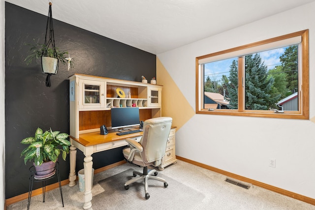 view of carpeted office space