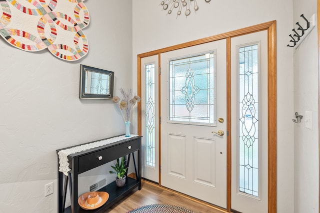 foyer entrance featuring light hardwood / wood-style floors