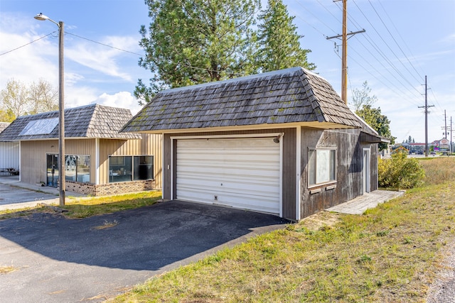 garage with driveway