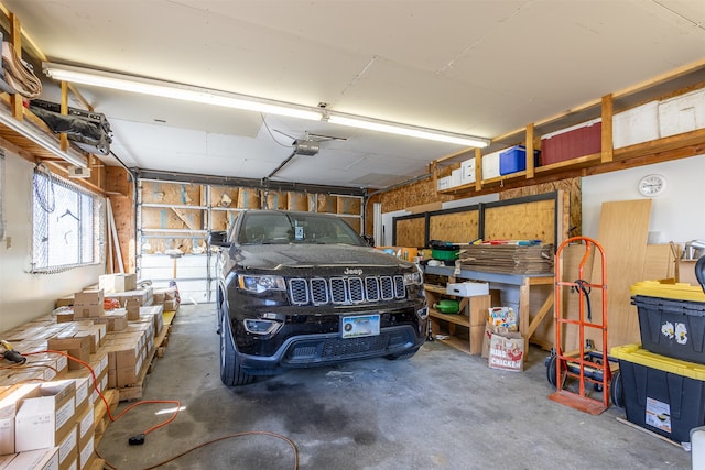 garage featuring a garage door opener