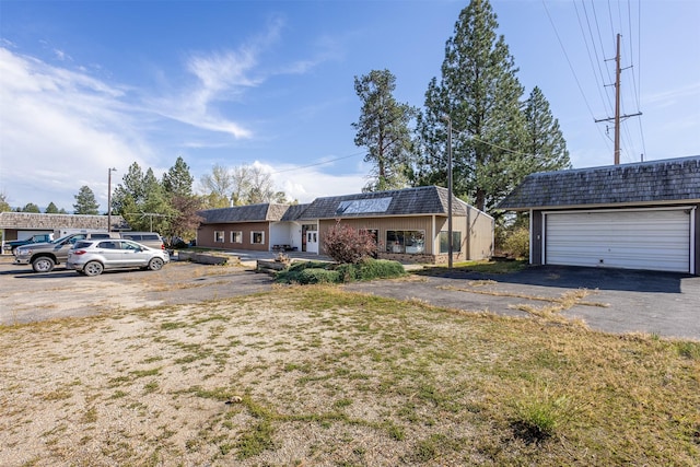 3938 US Highway 93 N, Stevensville, MT 59870 - ranch-style home featuring an outbuilding and mansard roof