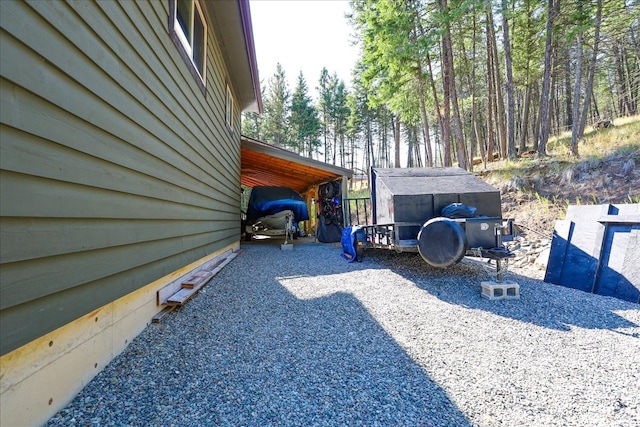 view of yard with a carport