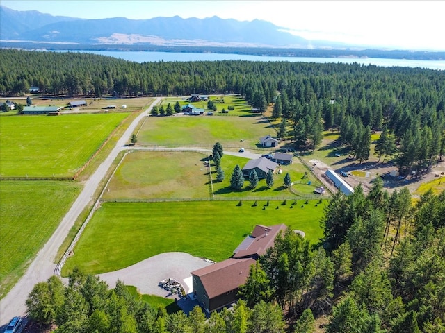 aerial view featuring a water and mountain view