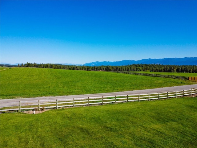 mountain view featuring a rural view