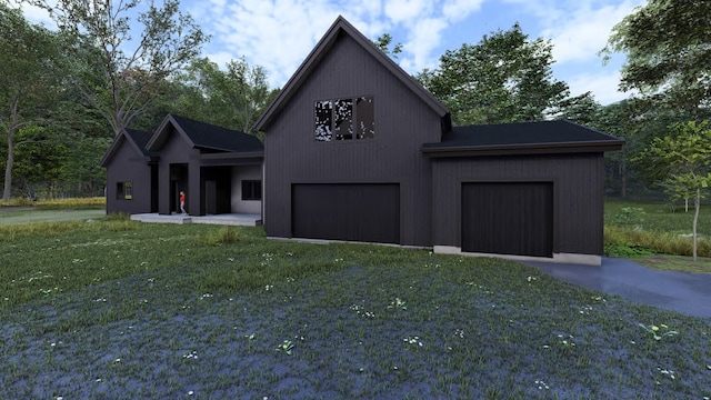 325 River Ranch Rd, Whitefish, MT 59937 - view of front facade with driveway and a front lawn