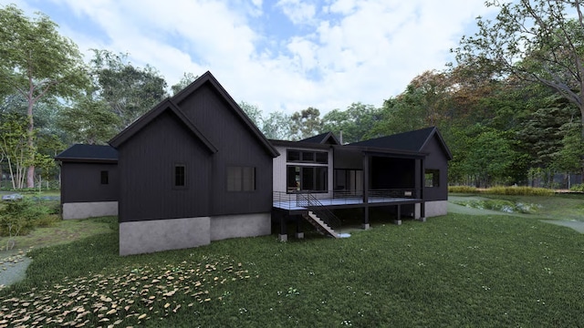 325 River Ranch Rd, Whitefish, MT 59937 - rear view of house featuring a lawn, stairway, and a deck