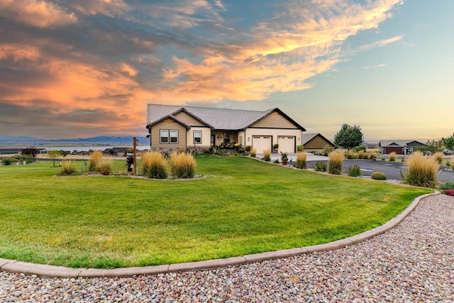 view of front of house featuring a yard and a mountain view