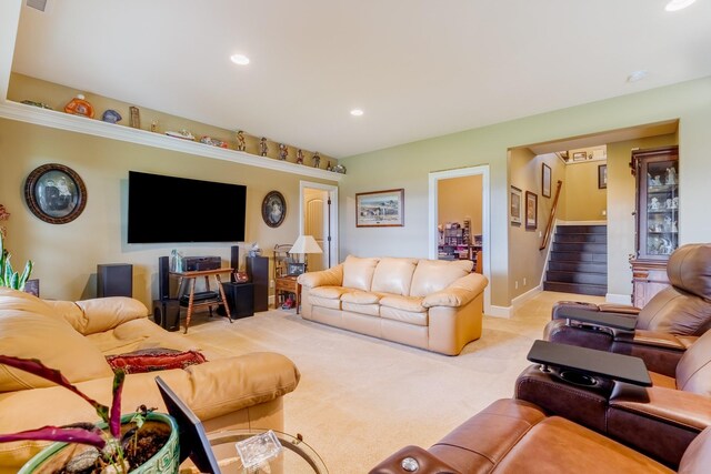 living room with light colored carpet