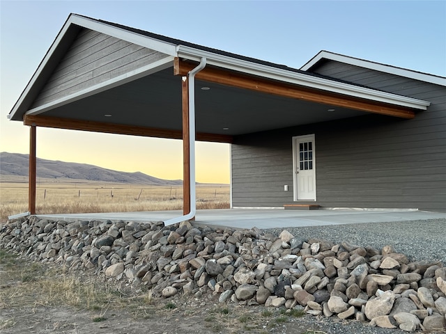 exterior space featuring a mountain view