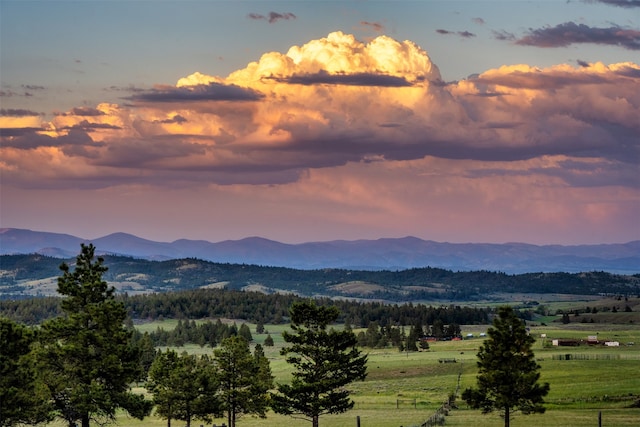 property view of mountains featuring a rural view