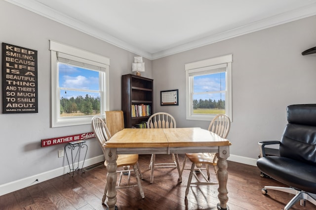 dining space with crown molding and dark wood-type flooring