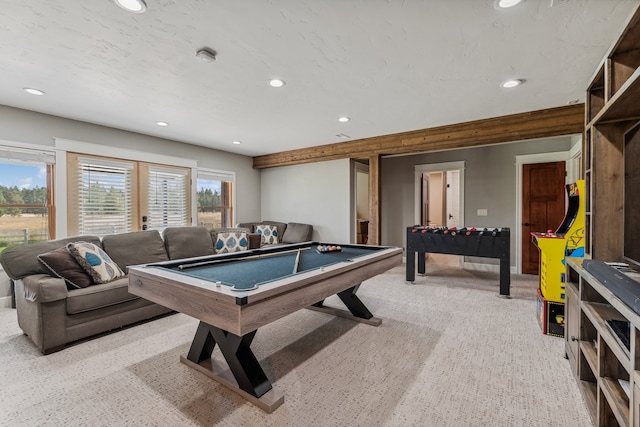 rec room featuring billiards, a healthy amount of sunlight, and light carpet