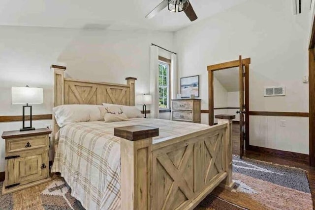 2870 US Highway 93 W, Whitefish, MT 59937 - bedroom with wood finished floors and a wainscoted wall