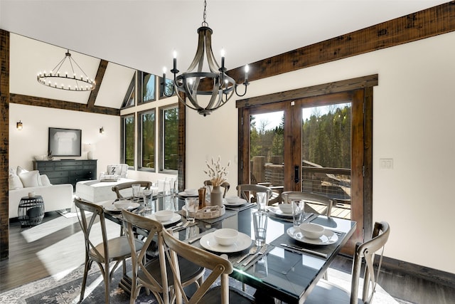 2870 US Highway 93 W, Whitefish, MT 59937 - dining room featuring a chandelier, wood finished floors, french doors, and vaulted ceiling