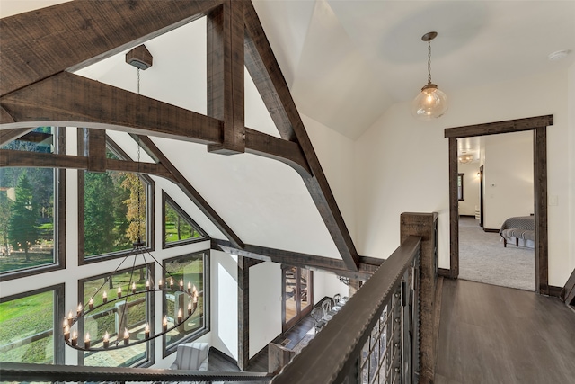 2870 US Highway 93 W, Whitefish, MT 59937 - interior space featuring a notable chandelier, high vaulted ceiling, and hardwood / wood-style floors