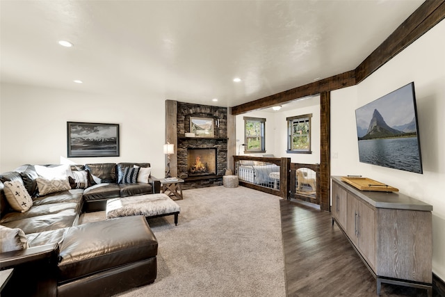 2870 US Highway 93 W, Whitefish, MT 59937 - living room featuring a fireplace, dark hardwood / wood-style floors, and beamed ceiling