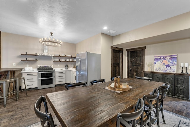 2870 US Highway 93 W, Whitefish, MT 59937 - dining area with dark wood-style floors and a chandelier