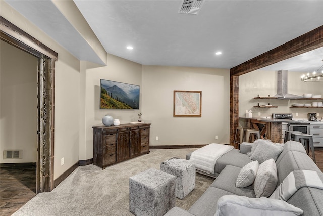 2870 US Highway 93 W, Whitefish, MT 59937 - carpeted living area featuring recessed lighting and a chandelier