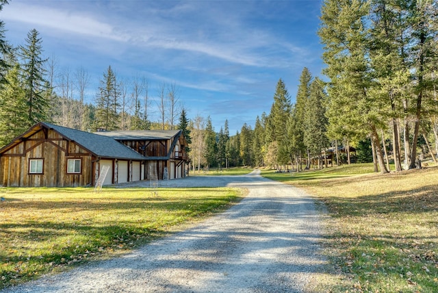 2870 US Highway 93 W, Whitefish, MT 59937 - view of dirt / gravel road with a forest view