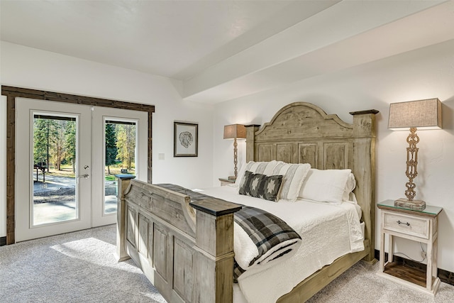 2870 US Highway 93 W, Whitefish, MT 59937 - bedroom featuring french doors, light carpet, and access to outside