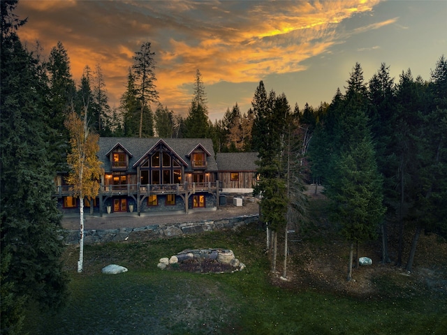 2870 US Highway 93 W, Whitefish, MT 59937 - back house at dusk with a yard
