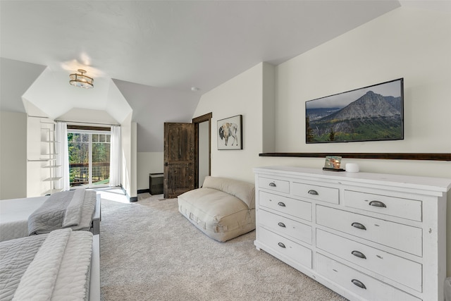2870 US Highway 93 W, Whitefish, MT 59937 - carpeted bedroom with access to outside and lofted ceiling