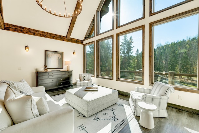 2870 US Highway 93 W, Whitefish, MT 59937 - living room with wood-type flooring, a chandelier, and high vaulted ceiling