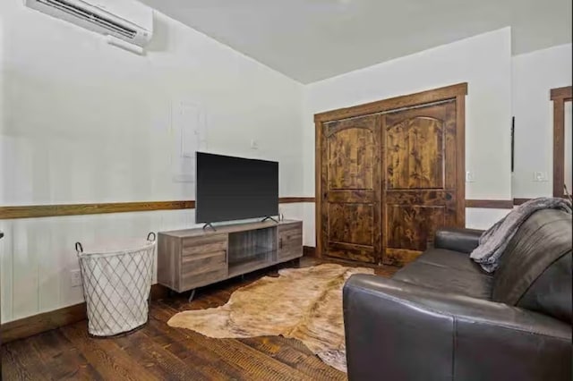 2870 US Highway 93 W, Whitefish, MT 59937 - living room with dark wood-type flooring and a wall mounted air conditioner