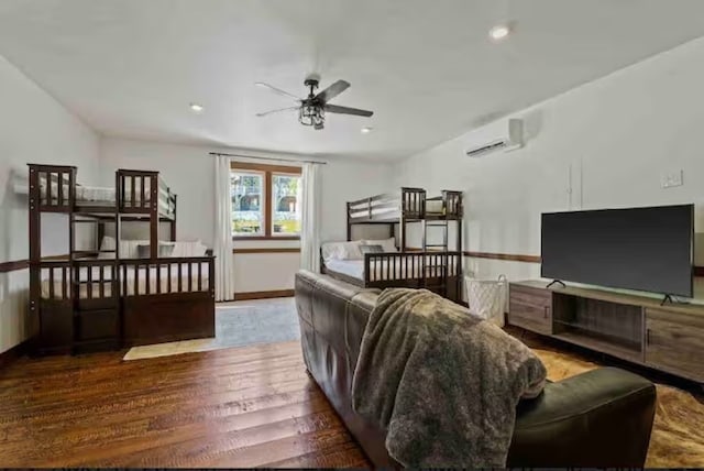 2870 US Highway 93 W, Whitefish, MT 59937 - living room with wood-type flooring, a wall unit AC, and ceiling fan