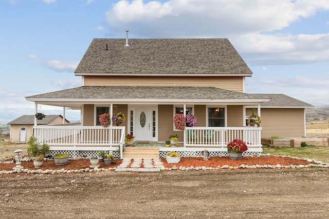 farmhouse inspired home with covered porch