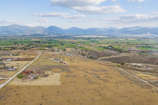 bird's eye view with a mountain view and a rural view