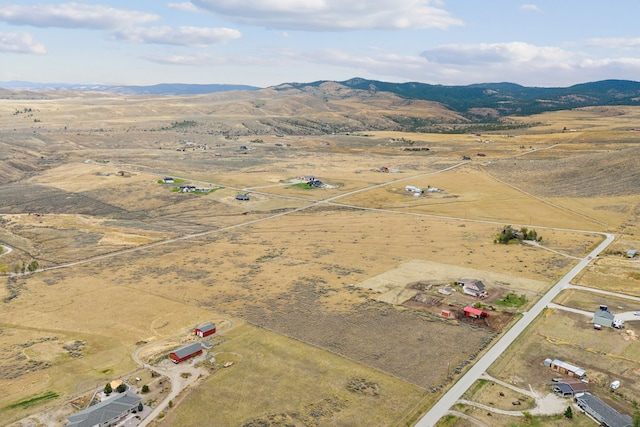 bird's eye view featuring a mountain view and a rural view