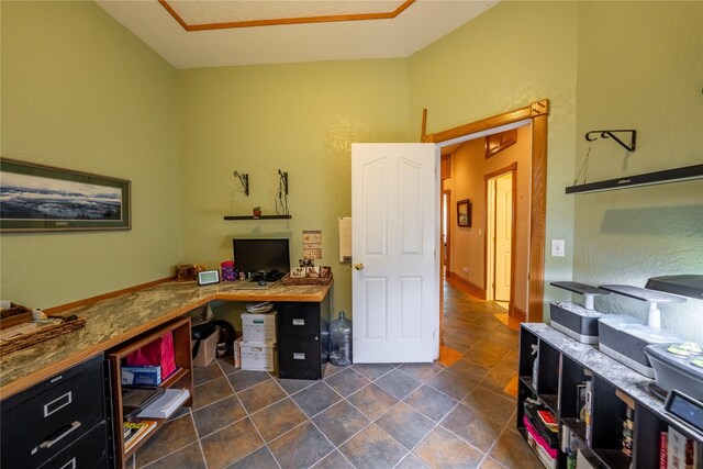 corridor with dark tile patterned flooring