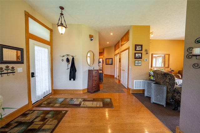 foyer entrance featuring dark hardwood / wood-style flooring