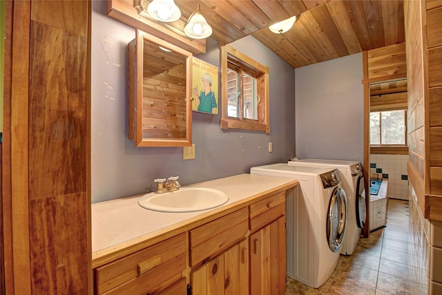 72878 Lemlama Trl, Arlee, MT 59821 - bathroom featuring tile patterned floors, washing machine and clothes dryer, vanity, and wooden ceiling