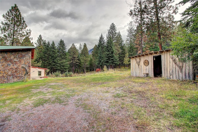 72878 Lemlama Trl, Arlee, MT 59821 - view of yard with an outdoor structure