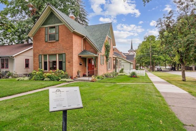 view of front of home with a front yard