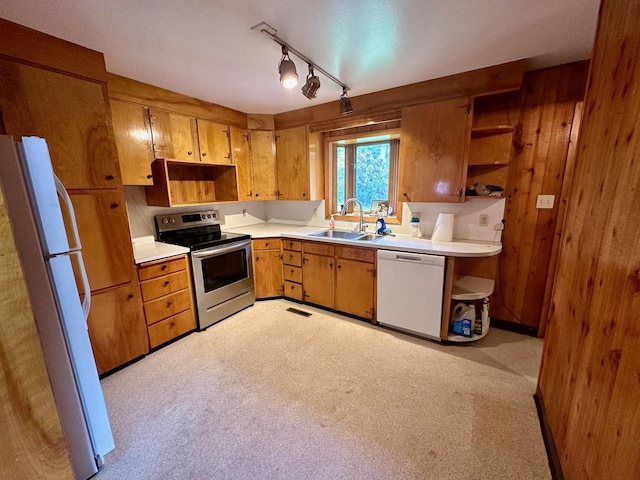 644 4th Ave E, Superior, MT 59872 - kitchen featuring white appliances, a sink, open shelves, and light countertops