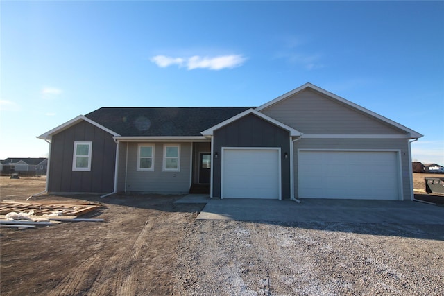 single story home with a garage