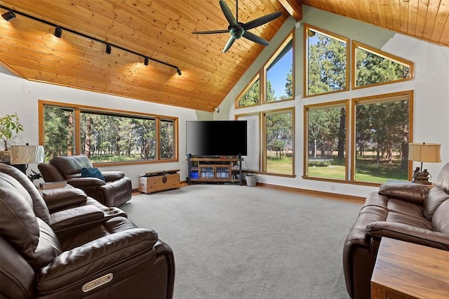 living room featuring baseboards, a ceiling fan, wood ceiling, carpet, and high vaulted ceiling