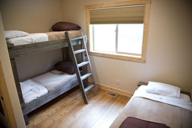 bedroom featuring light hardwood / wood-style floors