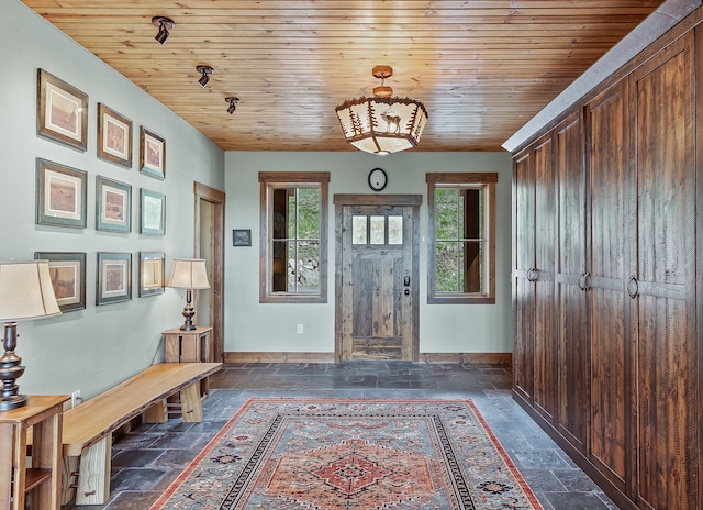 foyer featuring wooden ceiling