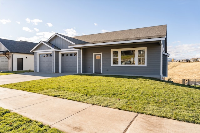 single story home with a garage and a front yard