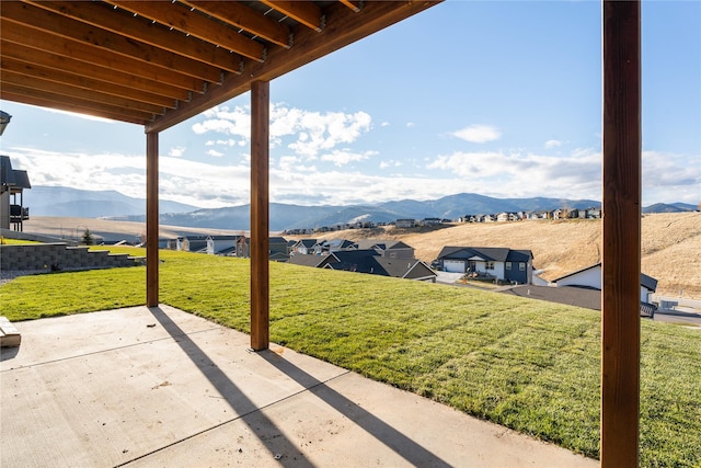 view of patio / terrace with a mountain view